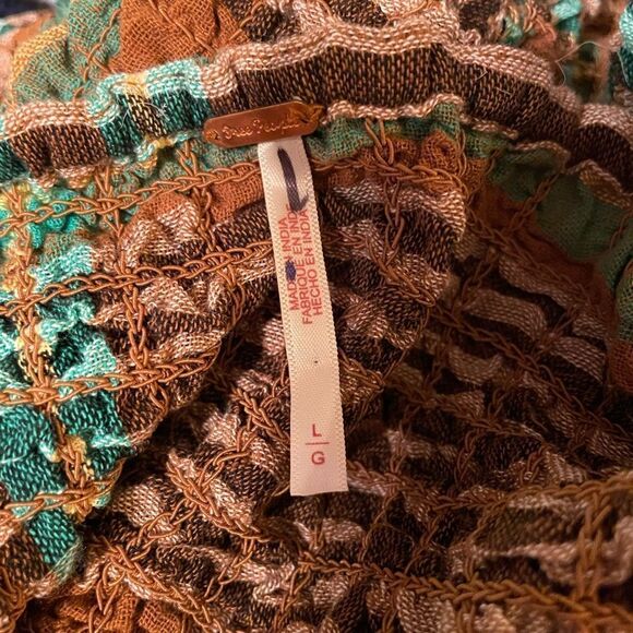 Free People Scarlett Smocked Mini Dress Stretch Fitted
Slim size L NWOT - Picture 8 of 8